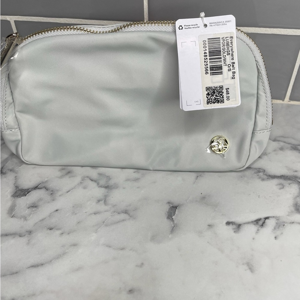 BRAND NEW! Lululemon Everywhere Belt Bag 1L Vapor White and Gold NWT wordmark